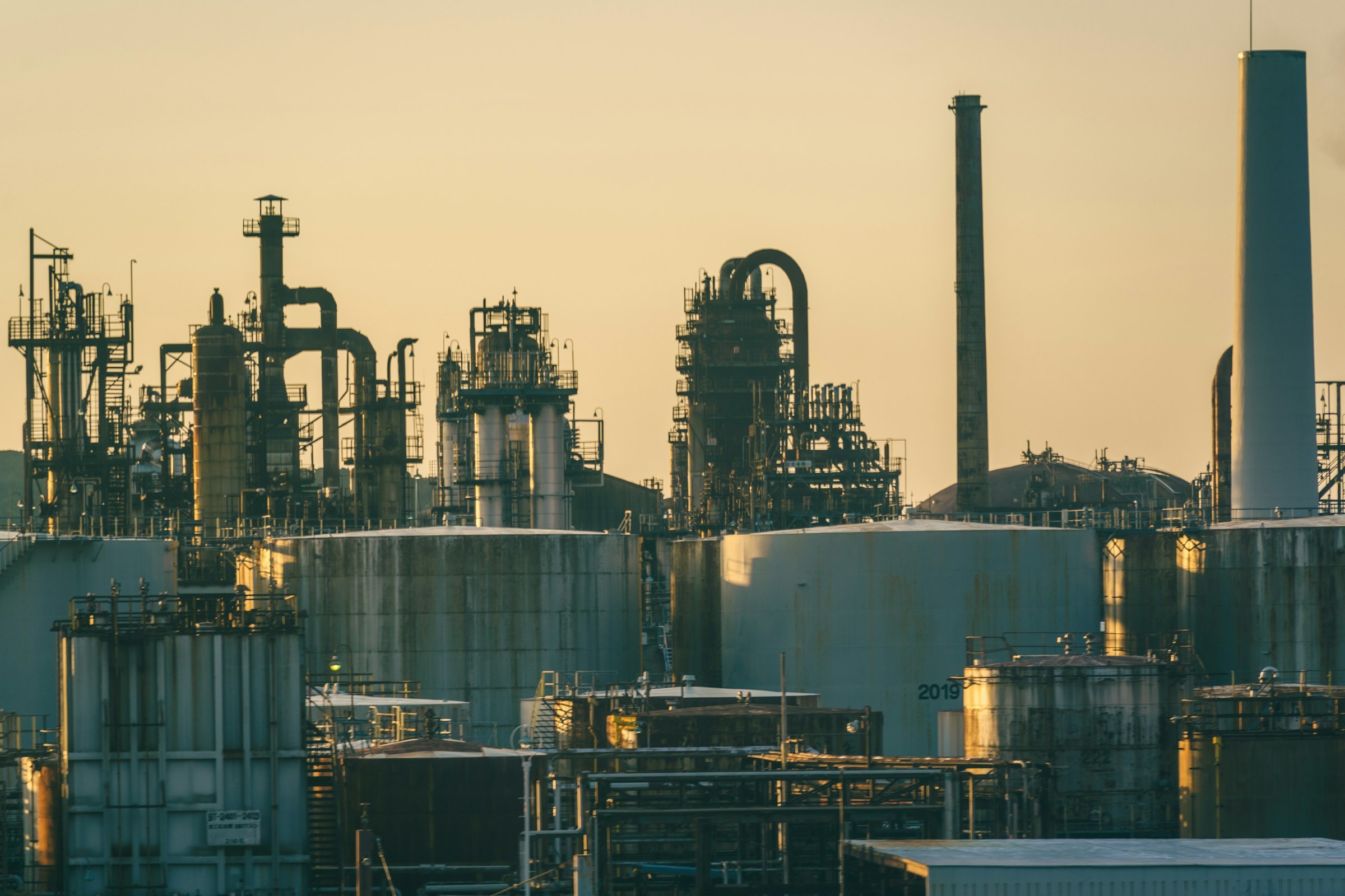 Storage tanks and process equipment at an industrial plant.