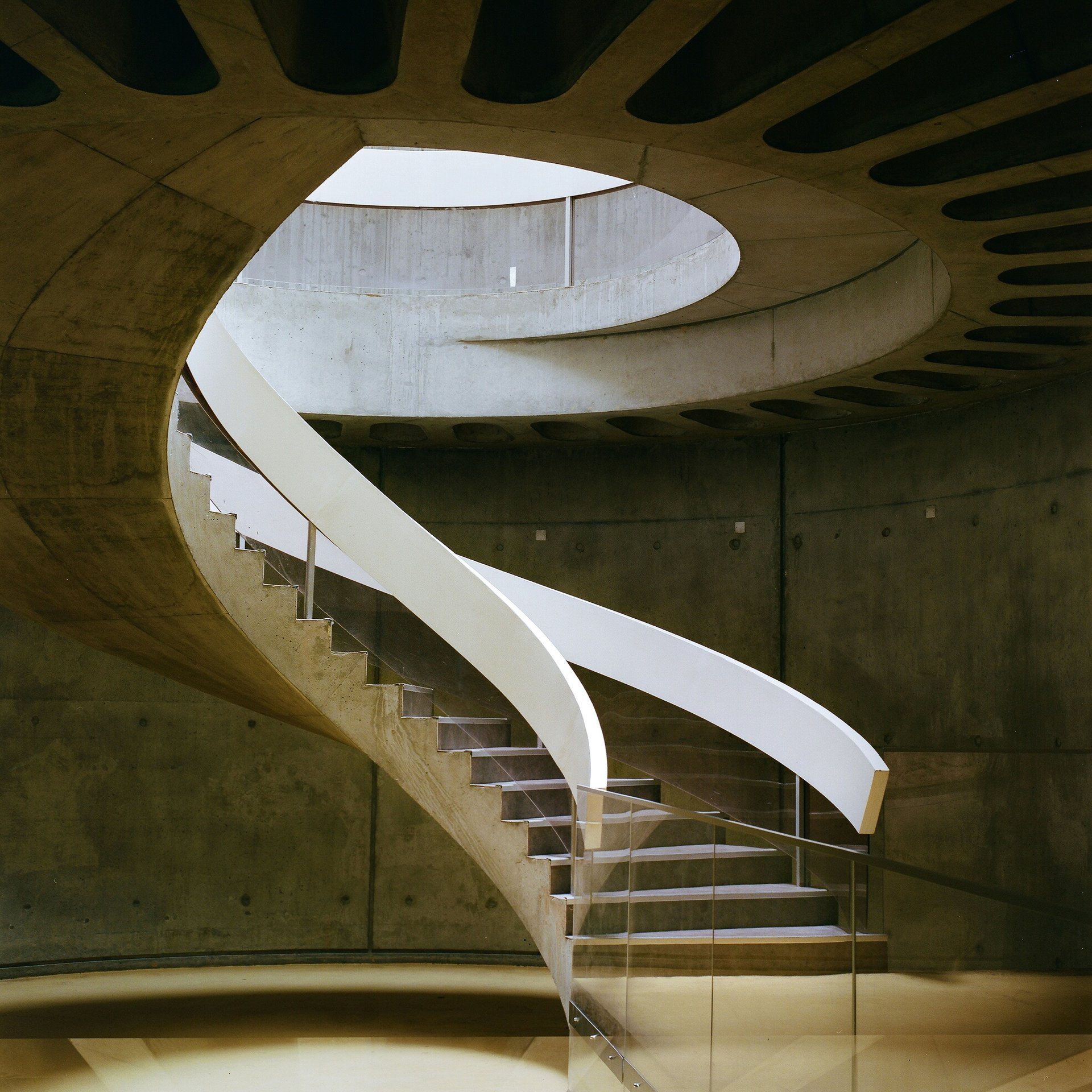 A sculptural concrete staircase at the Lugdunum museum in Lyon.
